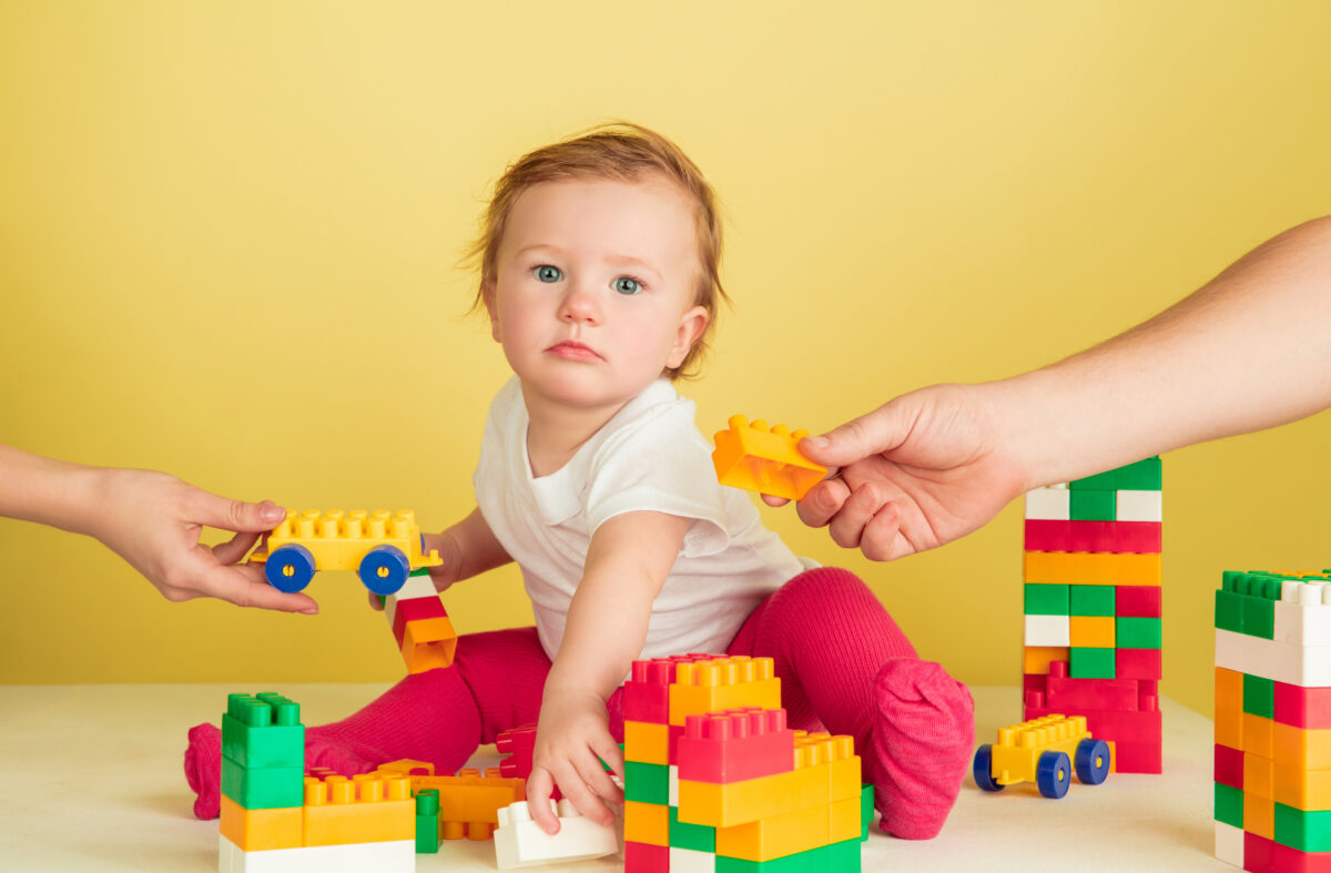 little-girl-playing-with-toy-blocks-1200x787.jpg